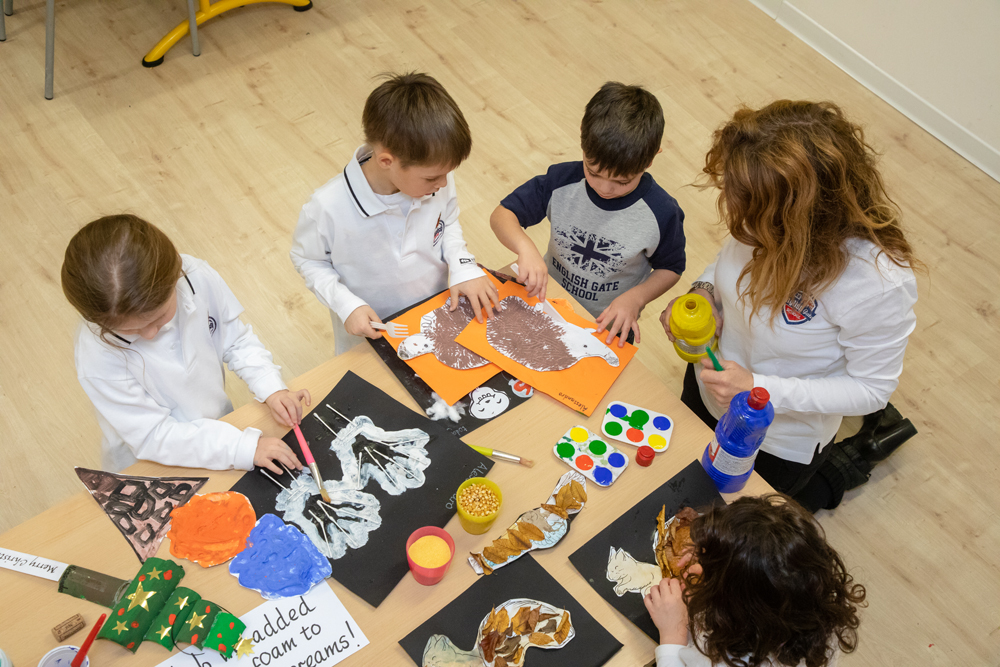 Children painting together - English Gate School
